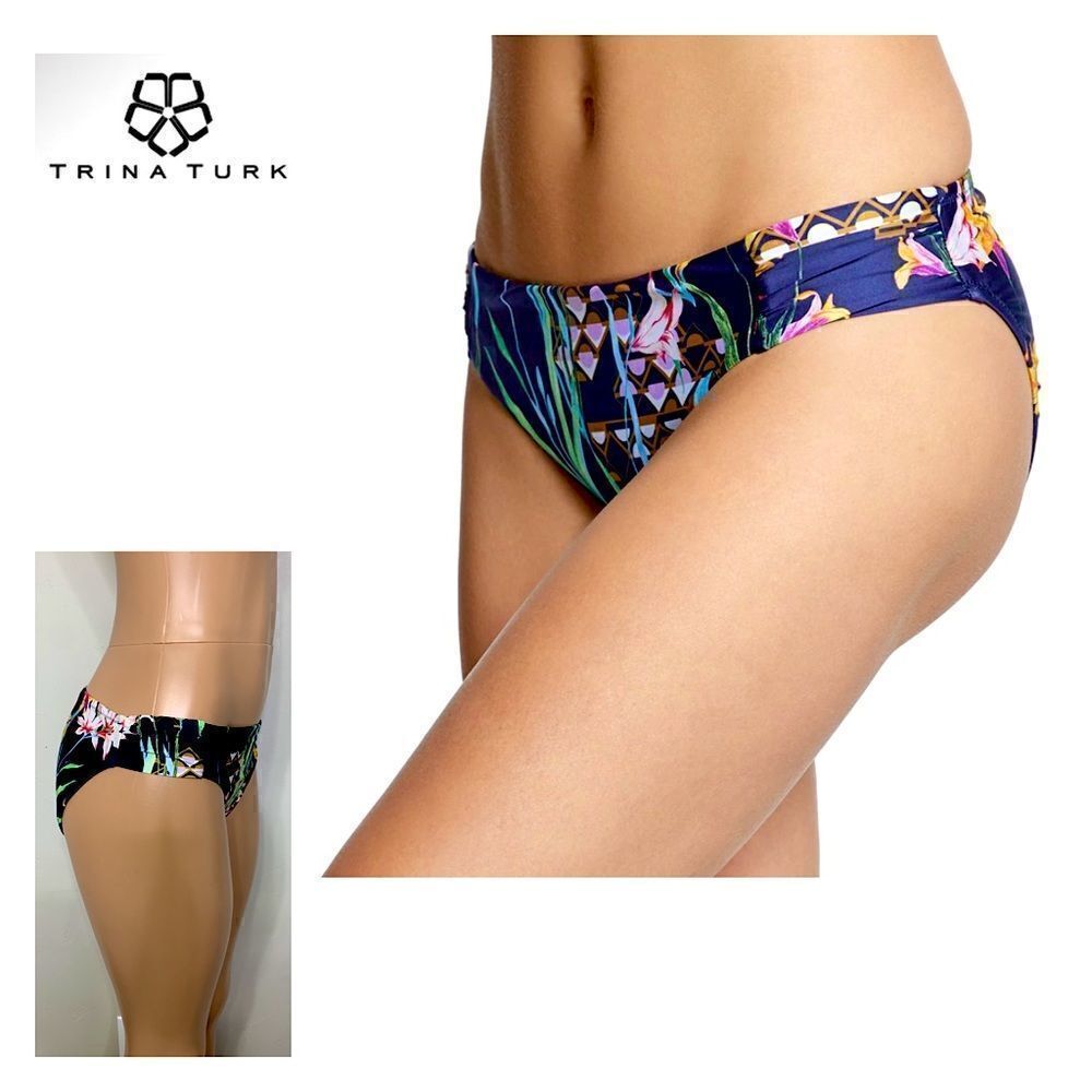 New. Trina Turk tropical bikini bottoms. Runs small. Navy, purple, gold, & pink.